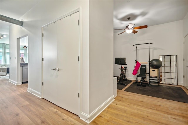 interior space featuring ceiling fan and light wood-type flooring