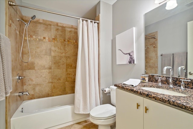 full bathroom featuring tile patterned floors, shower / bath combination with curtain, vanity, and toilet