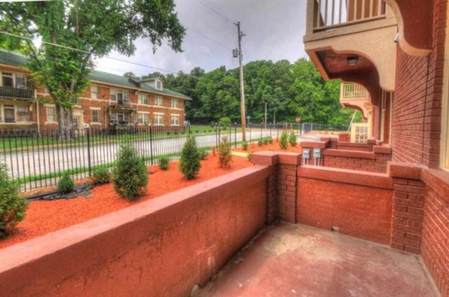 view of patio / terrace with a balcony