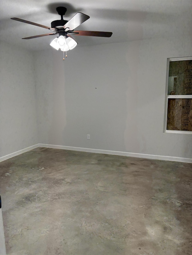 unfurnished room with concrete floors