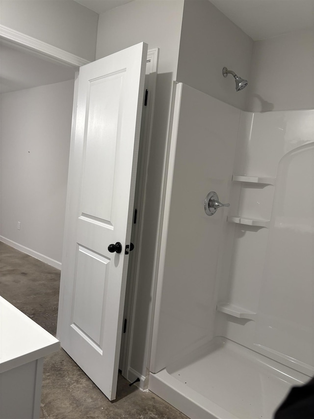 bathroom with vanity and walk in shower