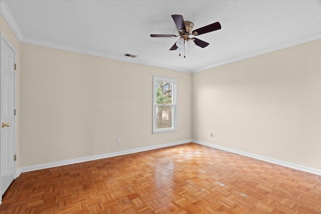 unfurnished room with baseboards, visible vents, a textured ceiling, and ornamental molding