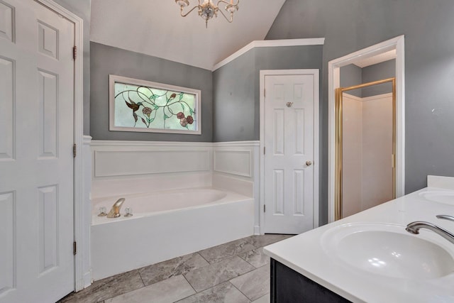 bathroom with vaulted ceiling, tile patterned floors, separate shower and tub, and vanity