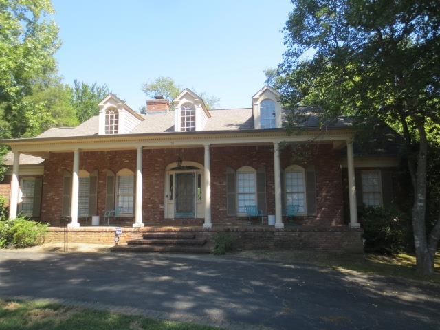 cape cod-style house featuring a porch