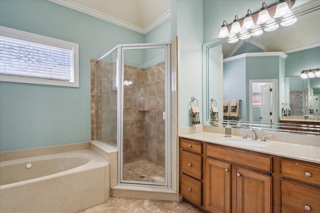 bathroom featuring plus walk in shower, ornamental molding, and vanity