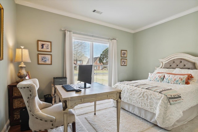 bedroom with ornamental molding