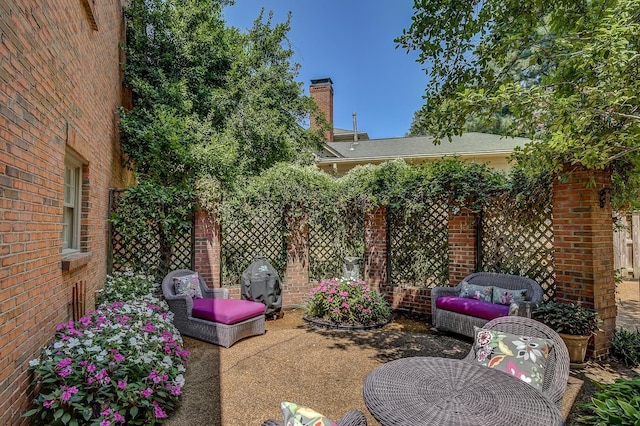 view of patio / terrace with grilling area and an outdoor living space