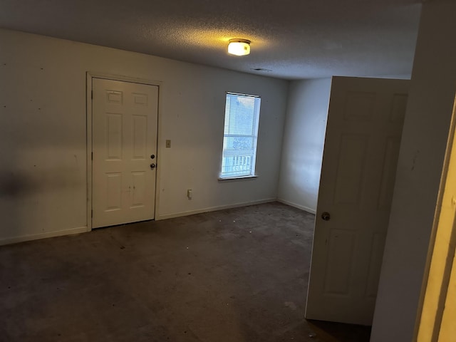 795 Williams Ave, Memphis, TN 38126 - carpeted foyer entrance featuring a textured ceiling and baseboards