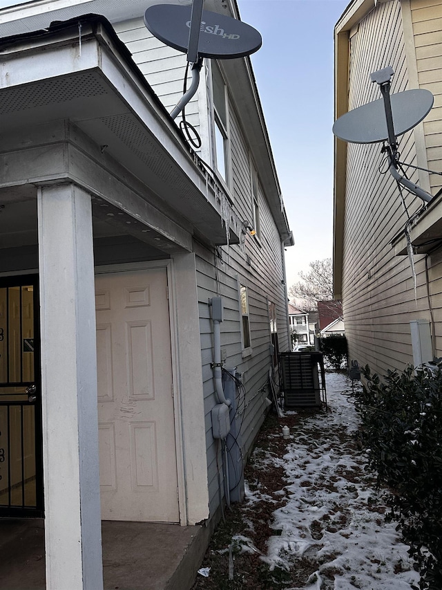 795 Williams Ave, Memphis, TN 38126 - view of snow covered exterior featuring cooling unit