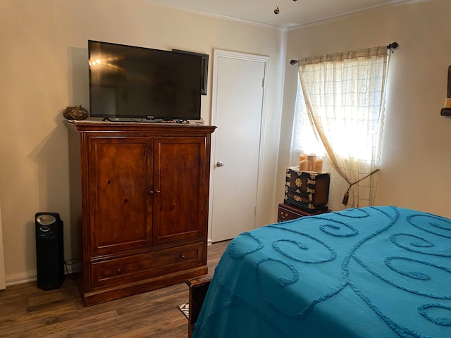 bedroom featuring hardwood / wood-style floors