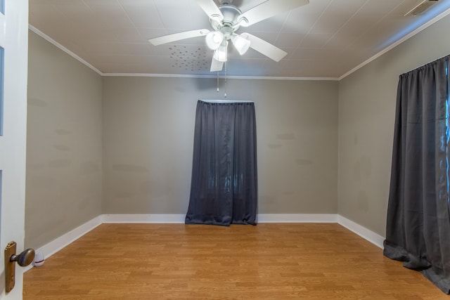 unfurnished room with light wood-type flooring, crown molding, and ceiling fan