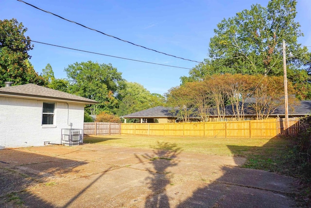 view of yard featuring a fenced backyard