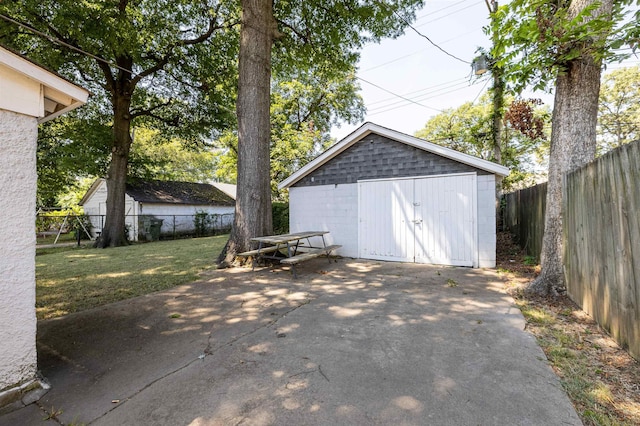 view of shed featuring a fenced backyard