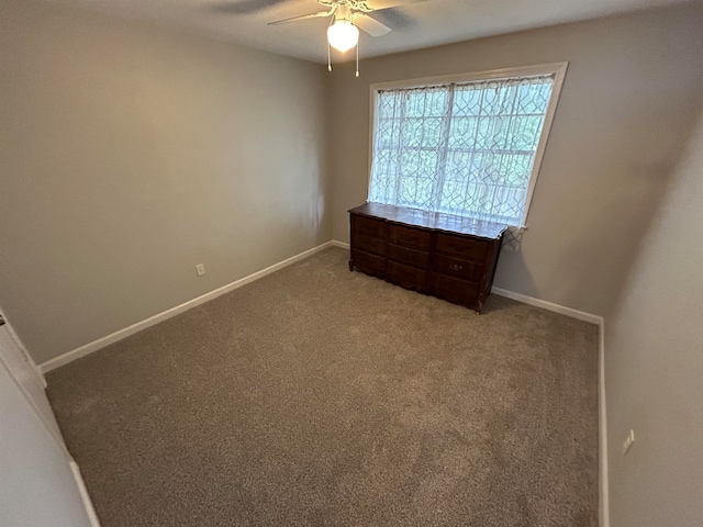 unfurnished bedroom featuring carpet flooring and ceiling fan