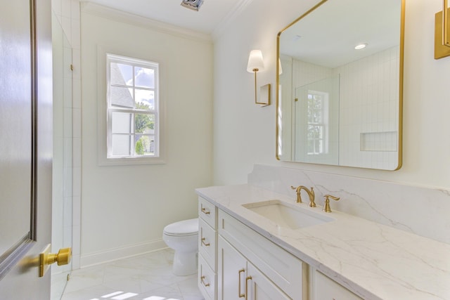 bathroom featuring tasteful backsplash, ornamental molding, vanity, tiled shower, and toilet