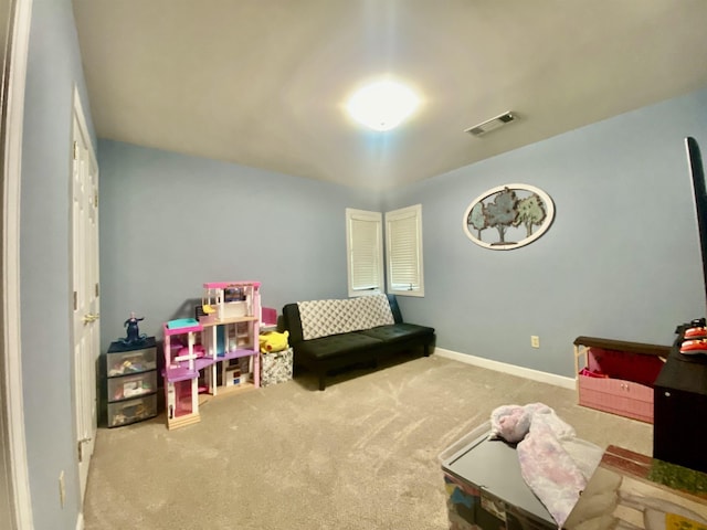rec room with visible vents, baseboards, and carpet floors