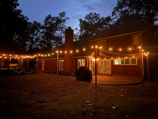 back of property with a patio area