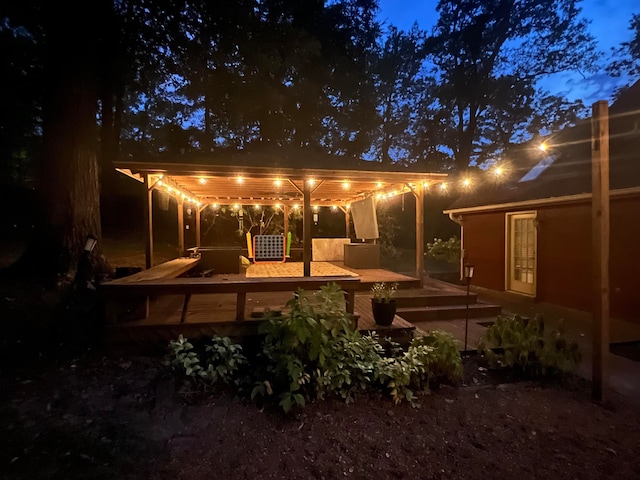 exterior space with a pergola and a deck