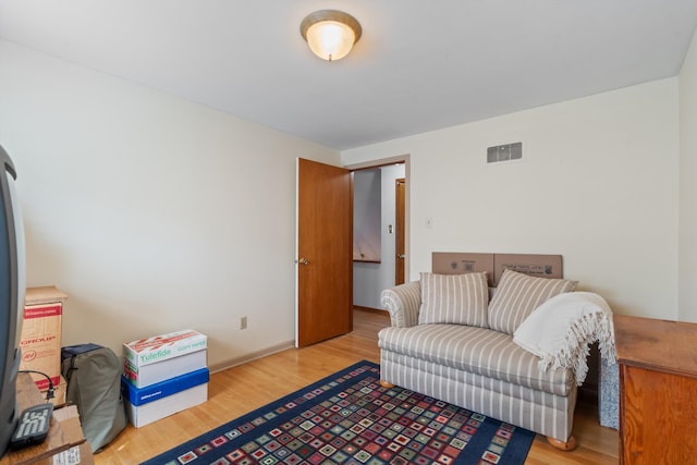 living area featuring light hardwood / wood-style floors