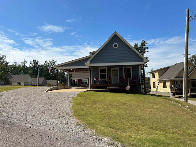 view of front of house featuring a porch and a front lawn