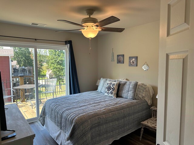 bedroom with access to outside, wood-type flooring, and ceiling fan