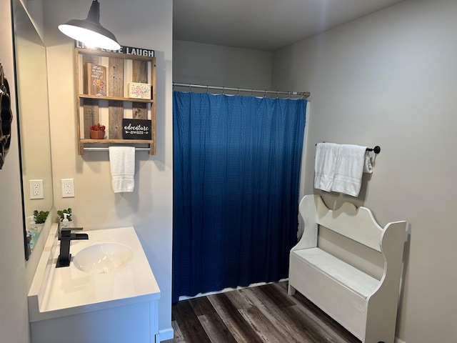 bathroom with vanity and wood-type flooring