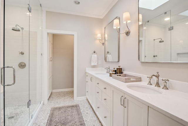 bathroom with ornamental molding, a sink, a shower stall, and double vanity