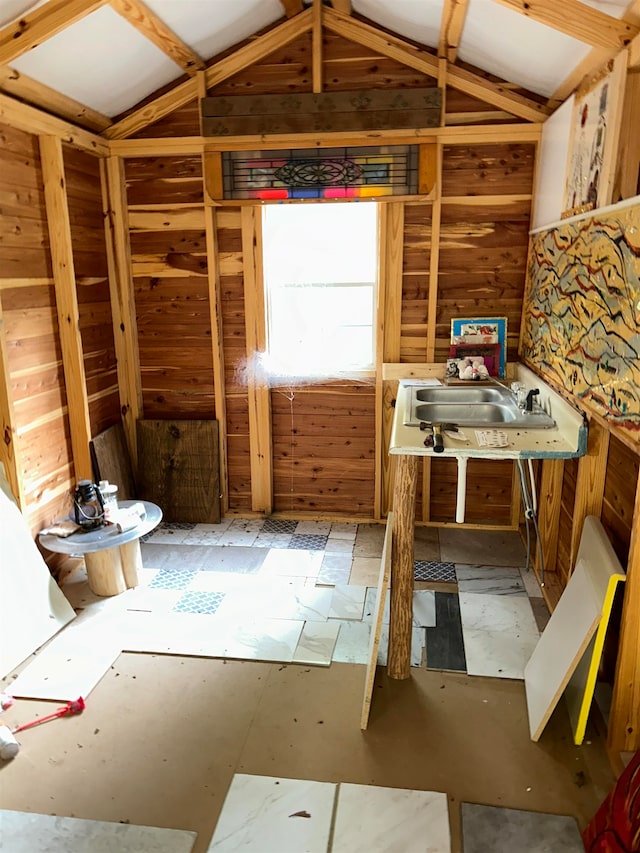 kitchen with sink and vaulted ceiling