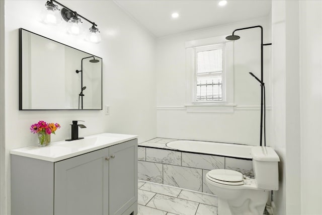 bathroom featuring toilet and vanity