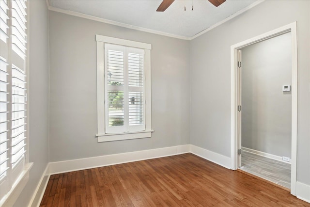 unfurnished room with hardwood / wood-style floors, ceiling fan, a textured ceiling, and ornamental molding