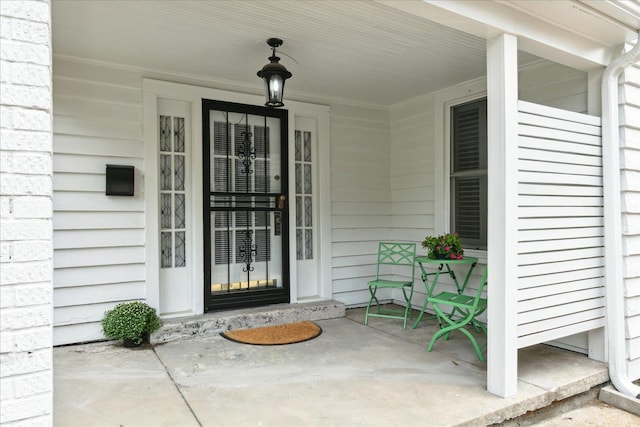 entrance to property with covered porch