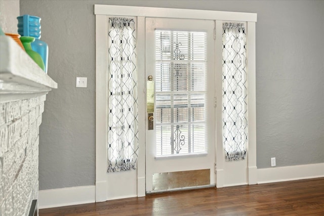 entryway featuring dark wood-type flooring