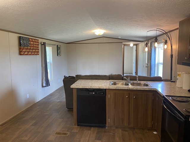7080 Beauty Hill Rd, Adamsville, TN 38310 - kitchen with a peninsula, visible vents, black appliances, a sink, and open floor plan