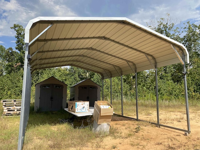 7080 Beauty Hill Rd, Adamsville, TN 38310 - view of parking / parking lot with a carport and a storage unit