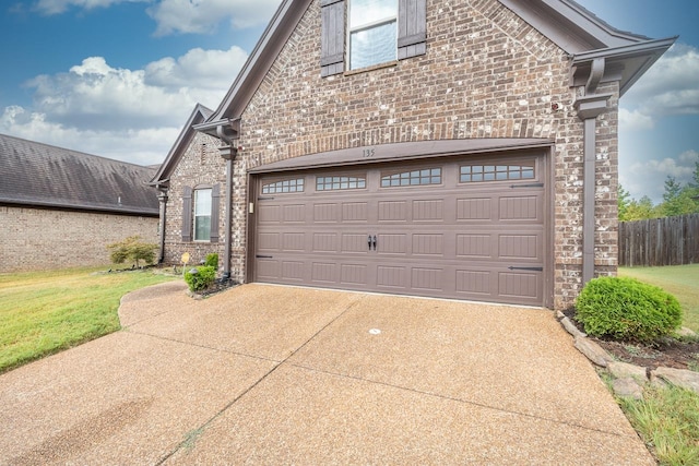 garage with a yard