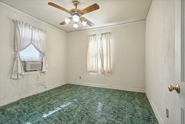 empty room featuring a healthy amount of sunlight, cooling unit, and ceiling fan