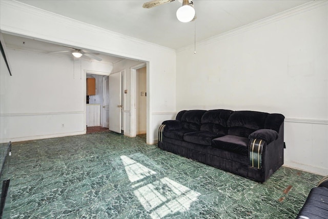 living room featuring ceiling fan and ornamental molding