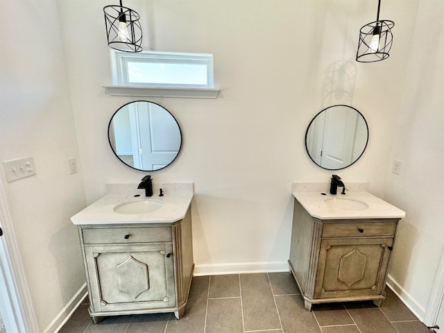 bathroom featuring tile patterned floors and vanity