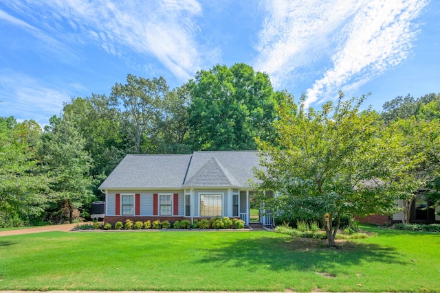 view of front facade with a front yard and a porch