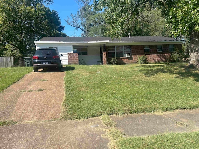 ranch-style house with a front yard