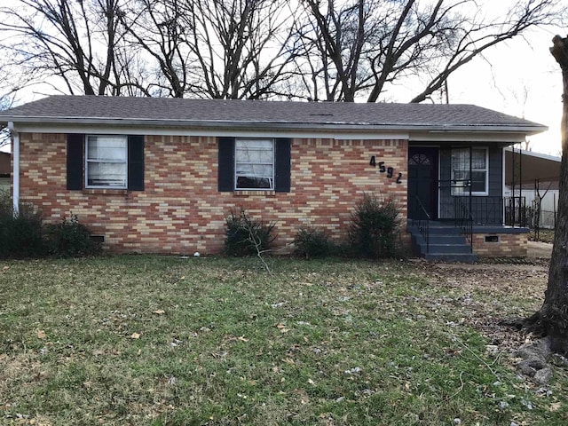 ranch-style home with a front yard