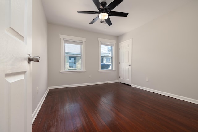 1111 N Watkins St, Memphis, TN 38107 - spare room featuring dark wood-style flooring and a ceiling fan