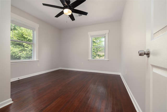1111 N Watkins St, Memphis, TN 38107 - empty room with dark wood-style flooring and a ceiling fan