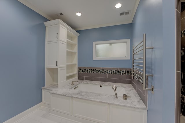 bathroom featuring a washtub and ornamental molding