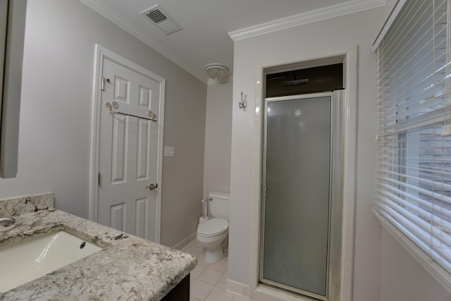 bathroom with tile patterned flooring, vanity, a shower with shower door, and crown molding