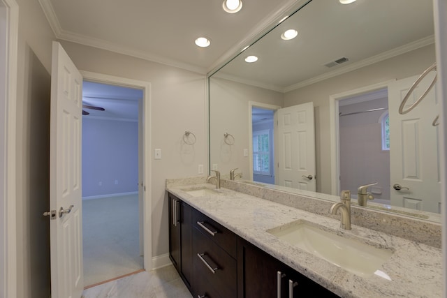 bathroom featuring vanity and crown molding