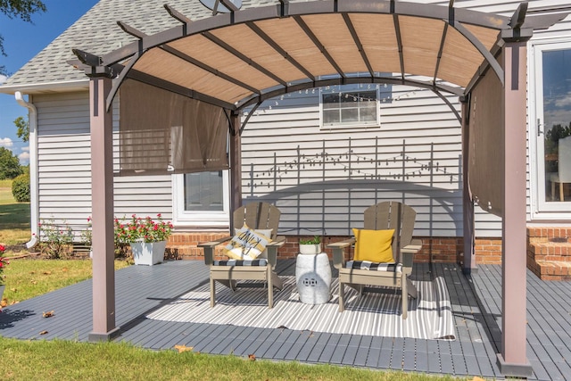 view of patio with a pergola and a wooden deck