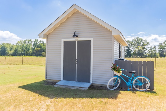 view of outdoor structure featuring a yard