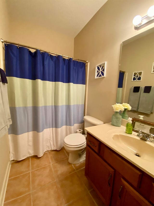 bathroom with toilet, tile patterned flooring, vanity, lofted ceiling, and a shower with curtain