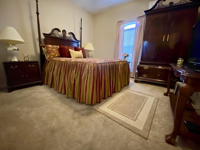 bedroom with light colored carpet